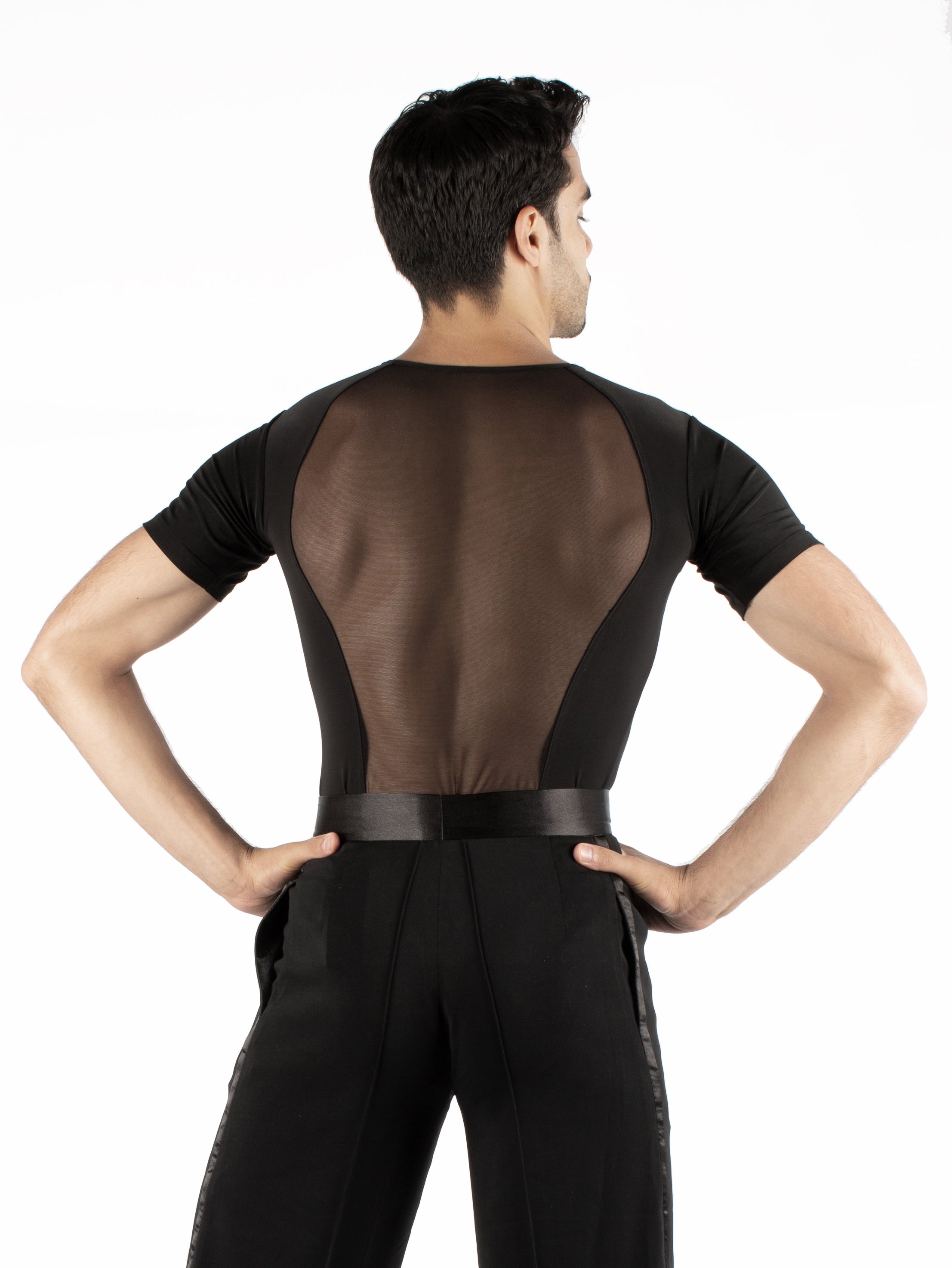 Short sleeved simplicity with an all mesh back. Super soft spandex, trunks attached with snap closure.