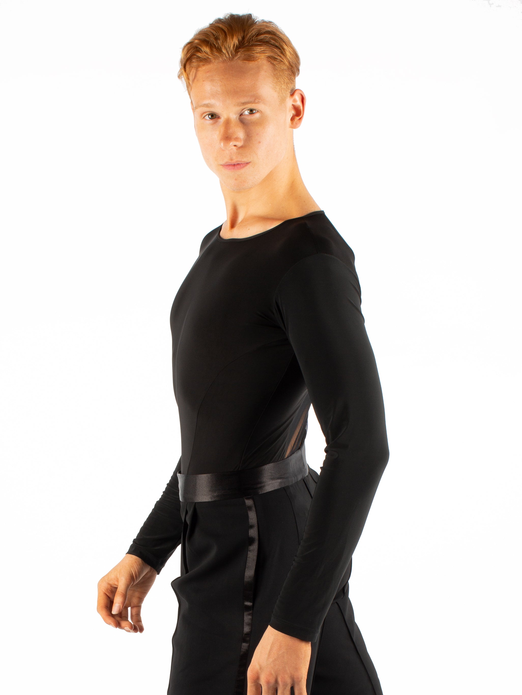 Long sleeved simplicity with an all mesh back. Super soft spandex, trunks attached with snap closure.