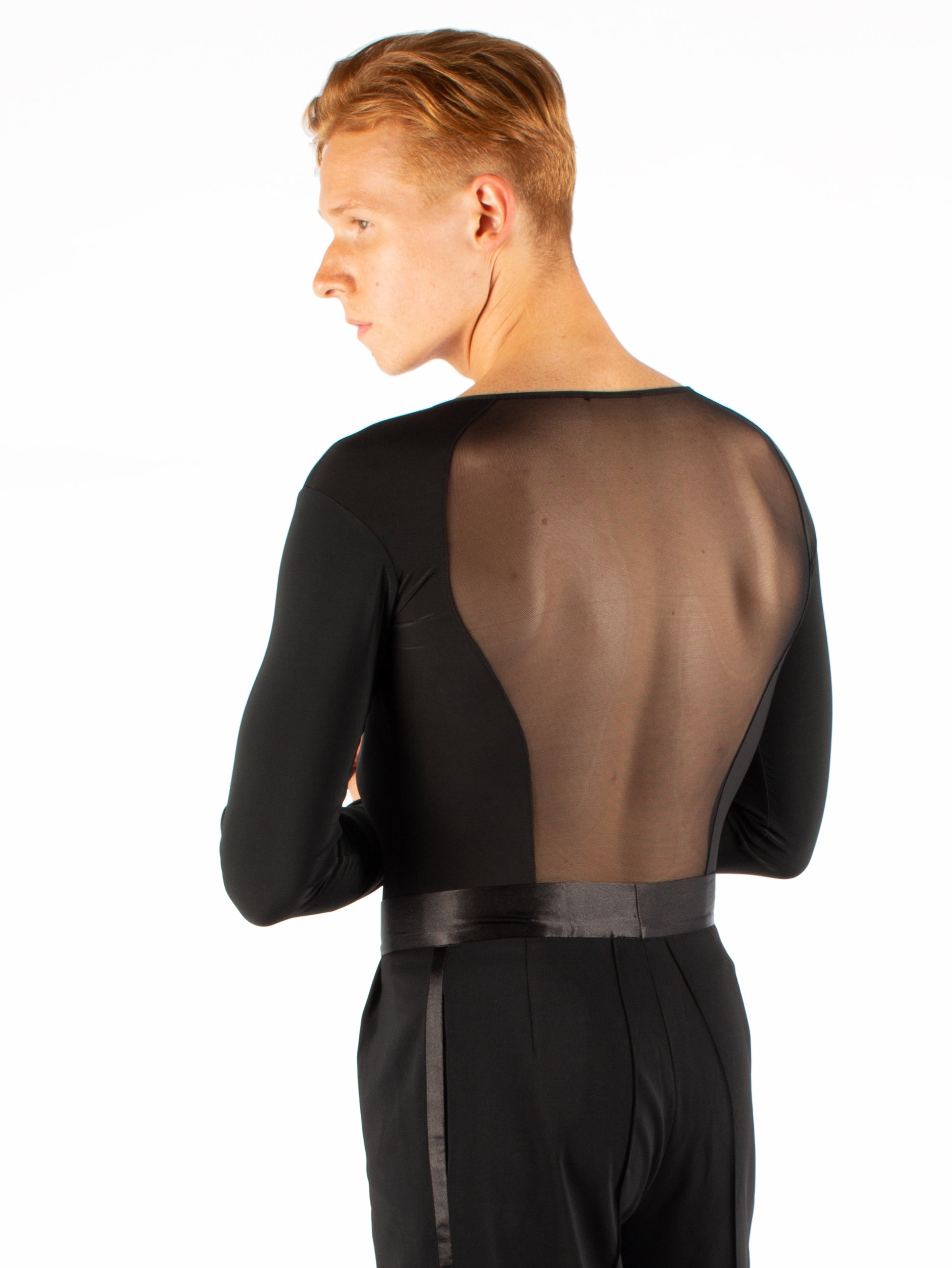 Long sleeved simplicity with an all mesh back. Super soft spandex, trunks attached with snap closure.