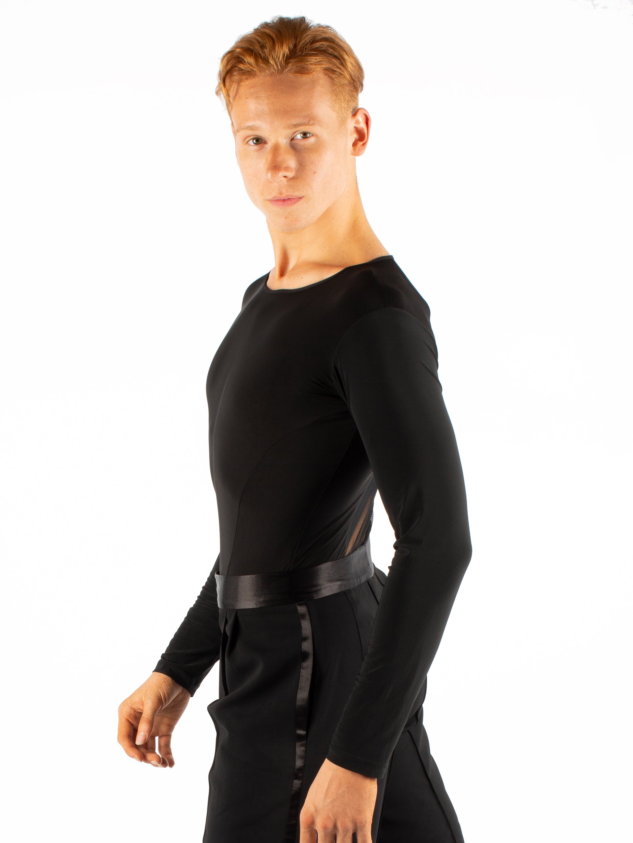 Long sleeved simplicity with an all mesh back. Super soft spandex, trunks attached with snap closure. 