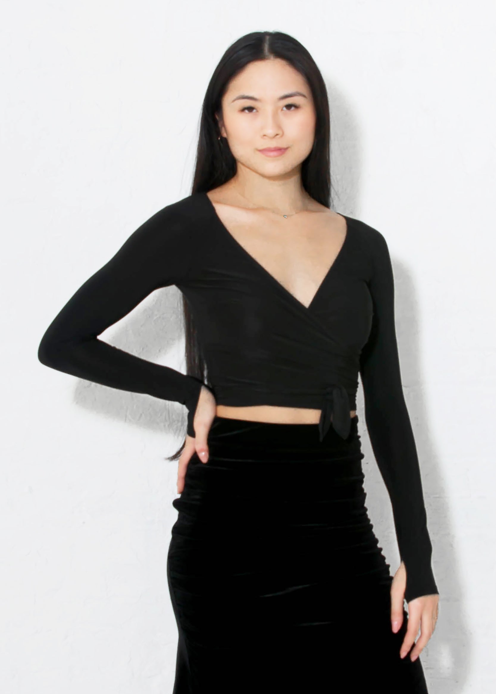 Miari women's black ballroom dance top with sporty thumb holes, and ties that can be tied in either the front or the back. Ultra silky quick-dry spandex